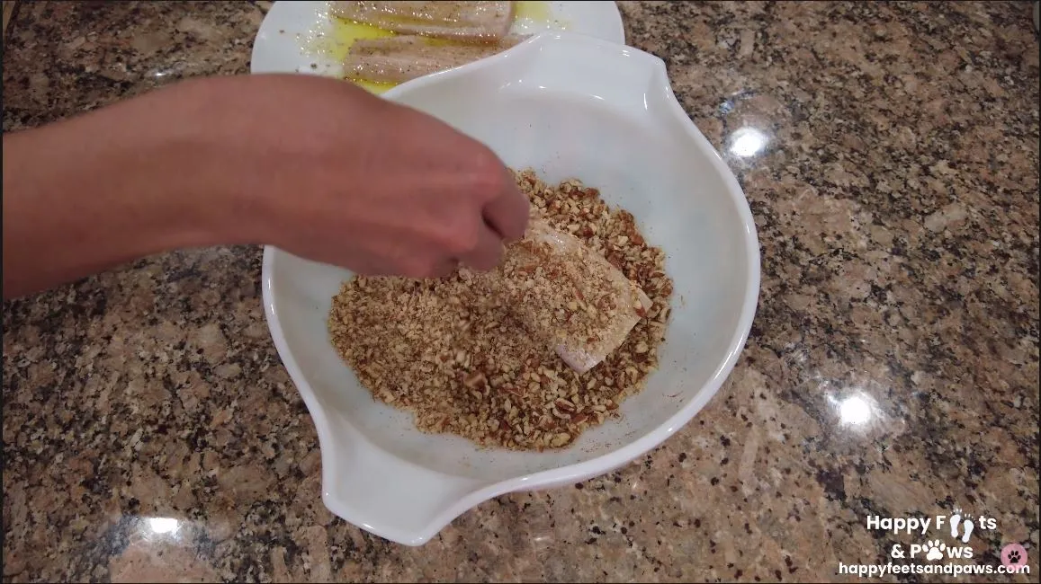 breading mahi mahi fish in bowl