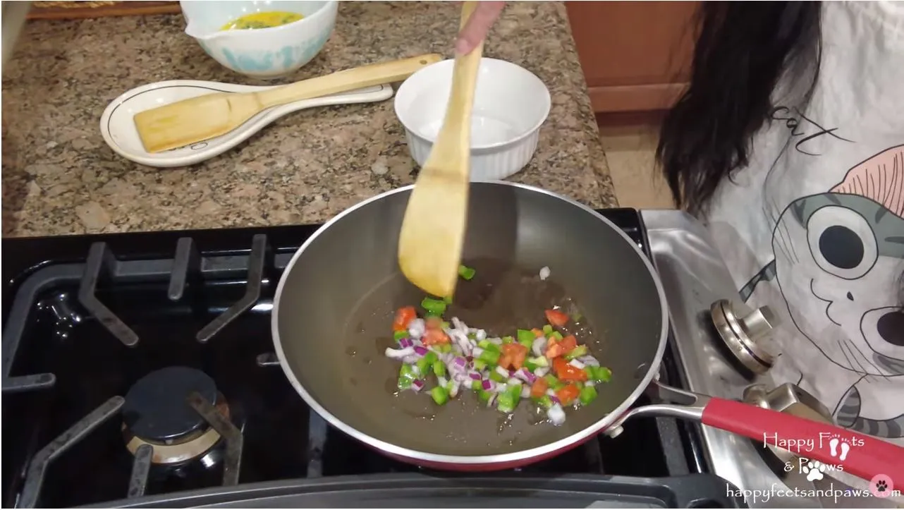 denever omelet ingredients being cooked