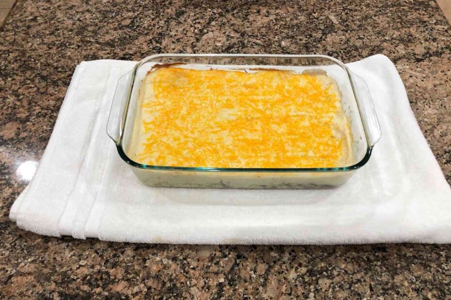 shepherds pie in a glassware with melted cheese on top