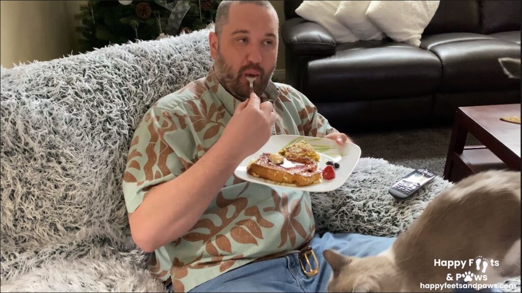 man eating french toast