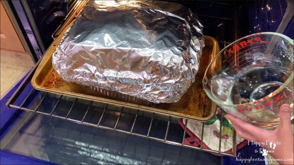 ham being put into oven