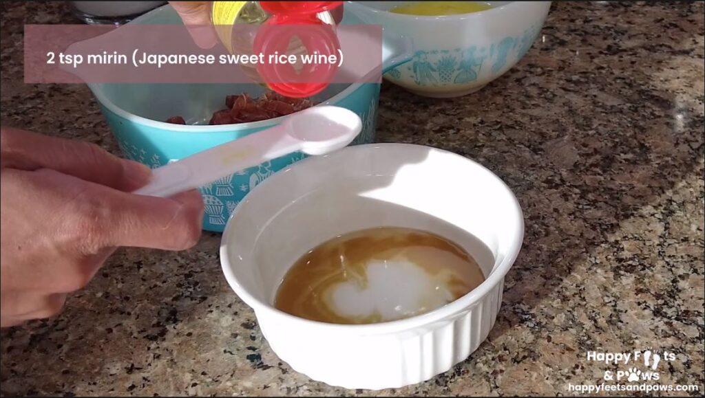 sweet wine sauce being mixed for Lap Xuong Fried Rice recipe