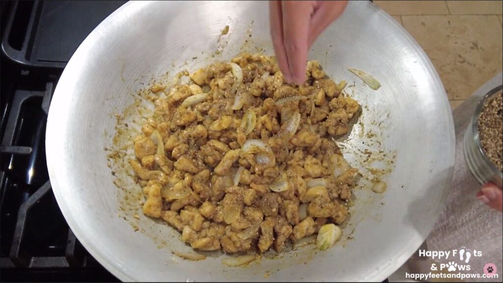 black pepper chicken cooking in a wok