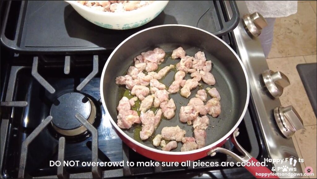 chicken cooking in a pot for black pepper chicken recipe