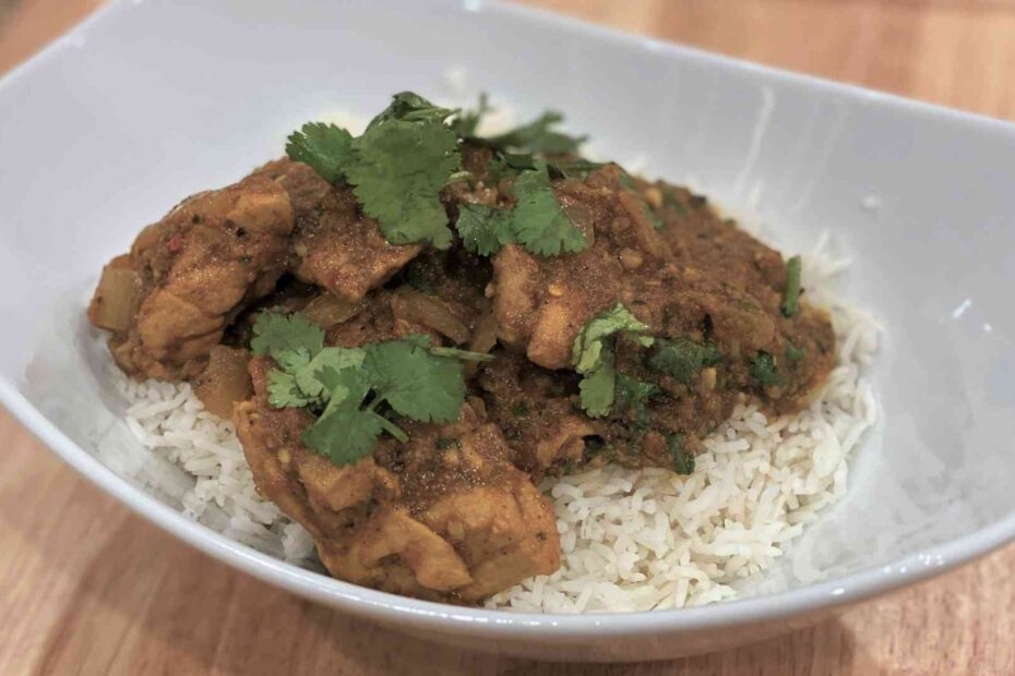 Chicken tikka masala in a bowl with basmati rice