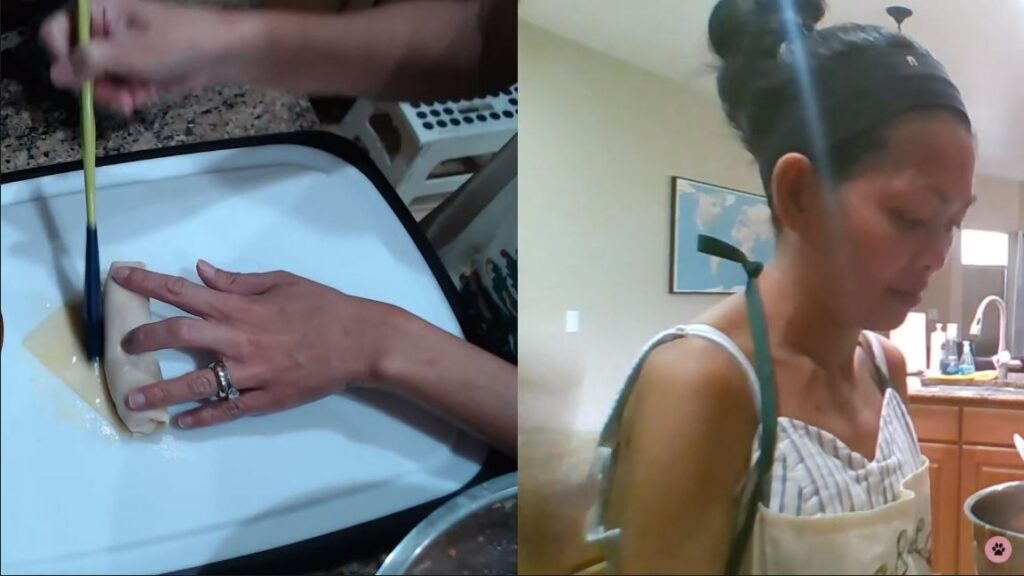 filipino lady rubbing egg wash on lumpia wrapper