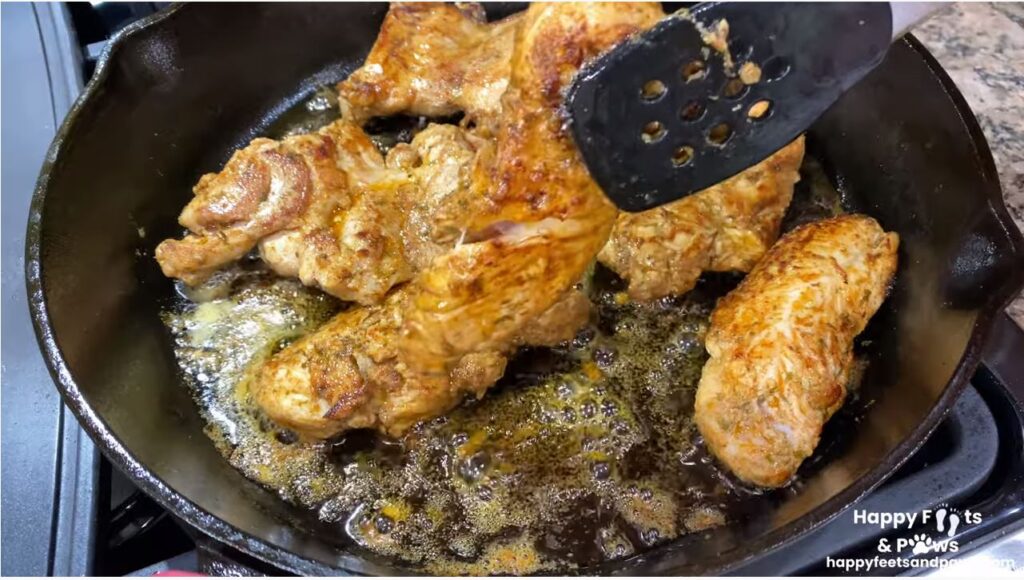 cooking chicken in iron skillet for chicken fajitas recipe