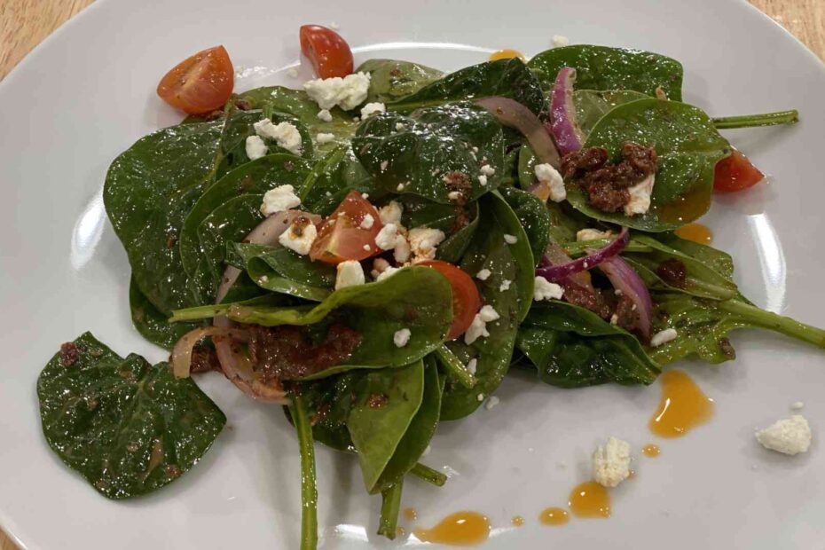 Spinach Salad with feta cheese on a plate
