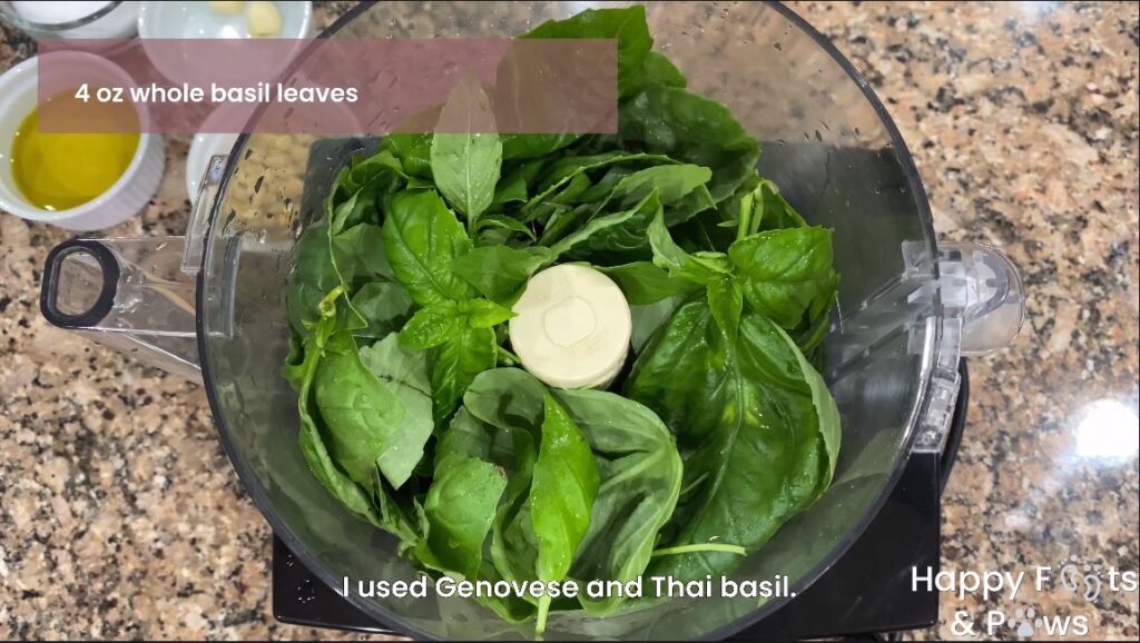 basil in a food processor for pesto sauce recipe