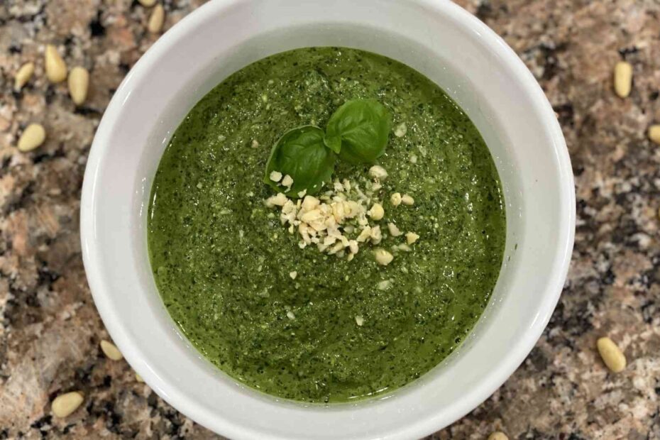 Fresh home made pesto in a small glass container
