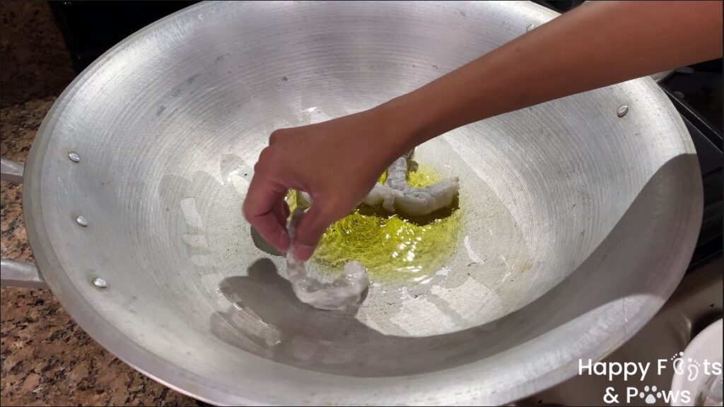 Cooking Shrimp on a wook with oil