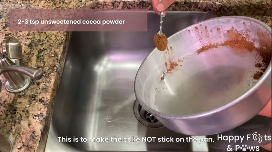 Adding cocoa powder to the edge of the buttered pan