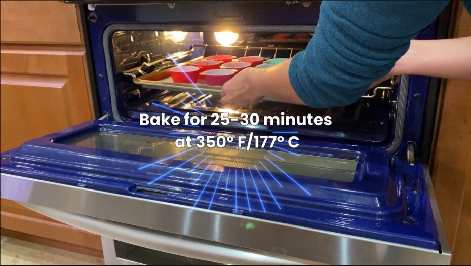 Placing the raw ube cupcakes into the oven for baking
