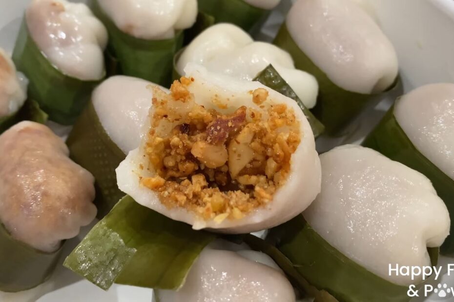 Glutinous Rice Balls with nuts inside wrapped with banana leaves