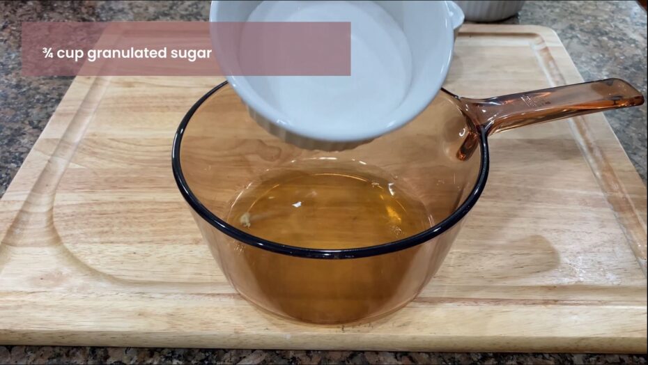 Adding the ingredients to a glassware that is stove top safe for Swiss Meringue
